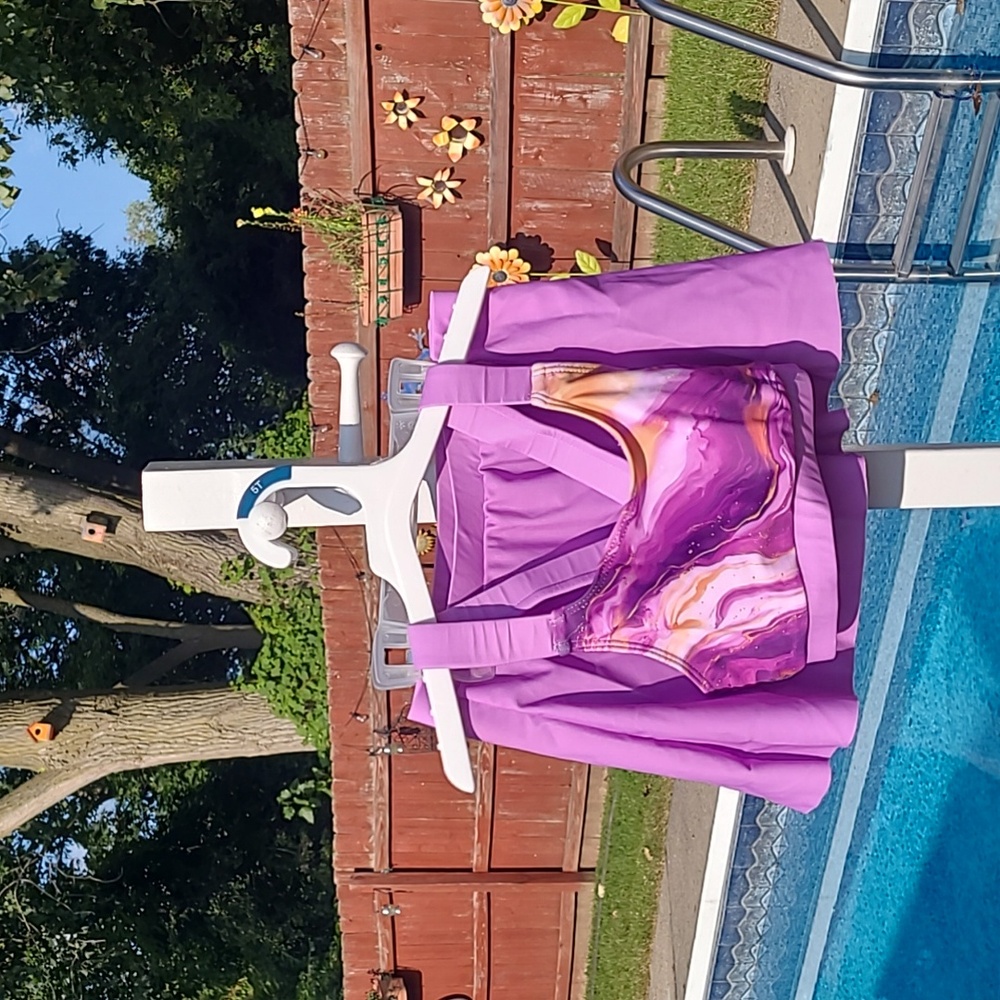 Brand new! Girls 7 two piece purple swirls swim suit top and skort bottoms set